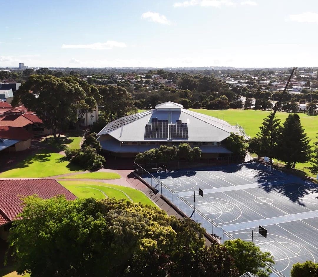 Prendiville College hall metal roof beside the sports oval, Perth