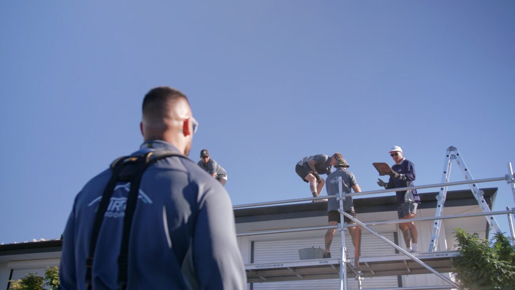 Working on Residential Roof Restoration Project